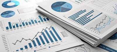 Detailed image of business reports with various charts, graphs, and data analysis, ideal for presentations, financial documents, and data-driven projects.